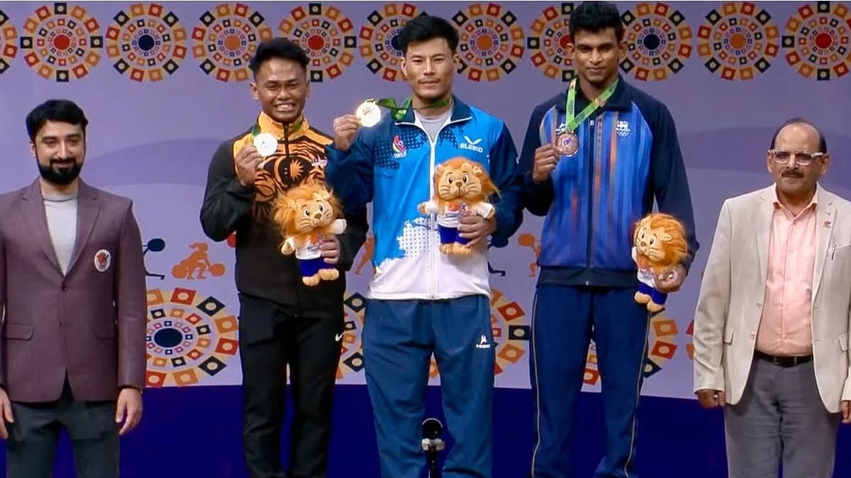 Rishikanta Chanambam posing after winning gold medal in 2025 Commonwealth Weightlifting Championship - Doordarshan Sports