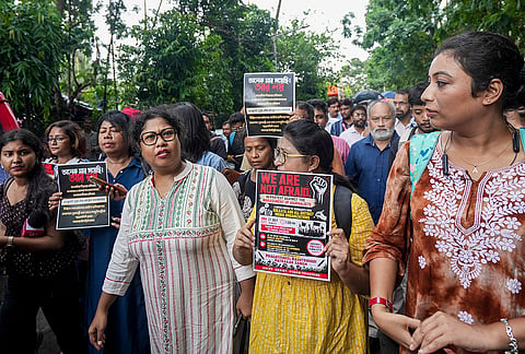 Journalists hold posters as they stage a protest against the alleged attack on media personnel during the rally of left students wing and CJP supporters on NEET paper leak issue, in Kolkata, West Bengal.
