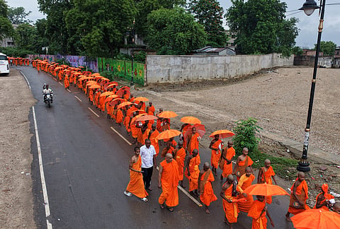 Novice monks walk in a procession in Sarnath.
