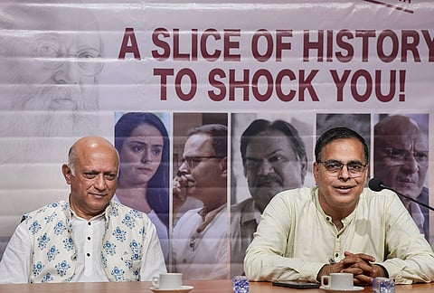 Actor Yatin Karyekar, left, and director Rajesh Gupta interact with media personnel ahead of the release of their film 'The Bose Files-Sach ya Sazish', in Kolkata, West Bengal.