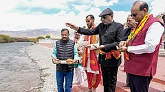 Vice President CP Radhakrishnan with Ladakh LG Vinai Kumar Saxena offers prayers at Sindhu Ghat, near Leh, Ladakh. - | Photo: @VPIndia/X via PTI
