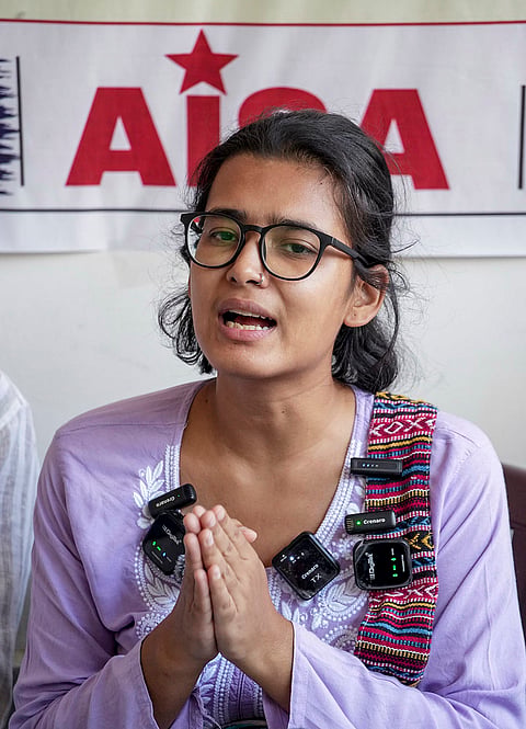 All India Students Association (AISA) National President Neha Bora addresses a press conference, at party office, in Patna.