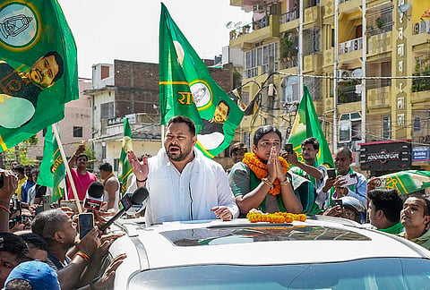 Bihar Assembly LoP and RJD leader Tejashwi Yadav during a roadshow in support of the party candidate Rekha Kumari Gupta ahead of the Bankipur Assembly by-poll, in Patna.