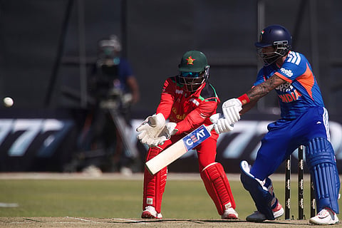 India's captain Shreyas Iyer, right, plays a shot as Zimbabwe's wicketkeeper Tadiwanashe Marumani during the third T20 cricket match between Zimbabwe and India in Harare, Zimbabwe.