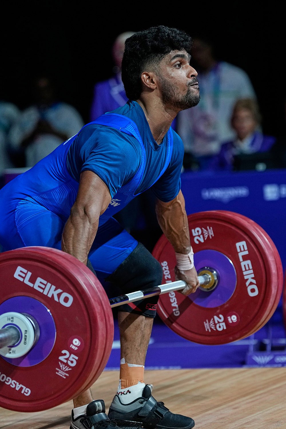 Indias Muthupandi Raja competes in the men 65 kilogram glasgow cwg 2026 weightlifting