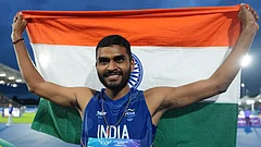 Sarvesh Anil Kushare, of India, poses after winning the silver medal in the men's high jump final at the Commonwealth Games in Glasgow, Scotland, Monday, July 27, 2026 - (AP Photo/Alastair Grant)