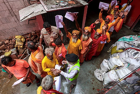 Seers wait for registration at Ram Mandir base camp amid the ongoing Amarnath Yatra, in Jammu.