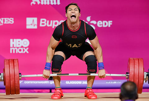 Erry Hidayat Muhammad of Malaysia during his Men's 79kg final weightlifting during the Commonwealth Games in Glasgow, Scotland, Monday, July 27, 2026. 