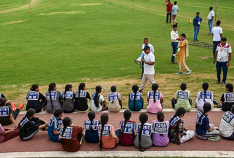 Female Candidates appear for the Physical Efficiency Test (PET) for Level-1 posts conducted by the Railway Recruitment Board (RRB), in Prayagraj, Uttar Pradesh.
