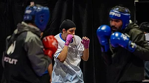Photo: PTI /Ravi Choudhary : Indian boxer Parveen Hooda, centre, during a training session ahead of the Glasgow Commonwealth Games 2026, at the SEC Centre in Glasgow, Scotland.