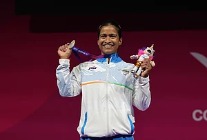 | Photo: Steve Walsh/PA via AP : Silver medal winner Gyaneshwari Yadav of India after the women's weightlifting 53kg snatch and the clean and jerk rounds at the SEC Armadillo during day four of the 2026 Commonwealth Games in Glasgow, Scotland, Monday, July 27, 2026.