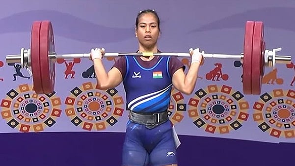 Nirupama Seram peforming a lift during the Commonwealth Championships. - insta/nirupama_seram