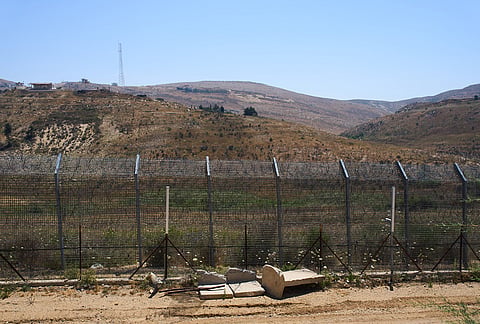 The border between Syria and the Israeli-controlled Golan Heights town of Majdal Shams is seen.