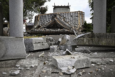 A collapsed shrine is seen, a day after an earthquake in Yatsushiro, Kumamoto prefecture, Wednesday, July 29, 2026.
