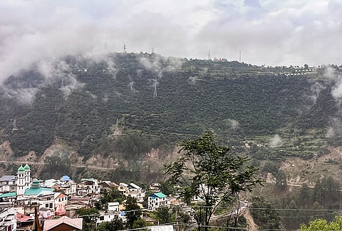 Mist-covered hills after rainfall during the monsoon season, in Doda, Jammu and Kashmir.