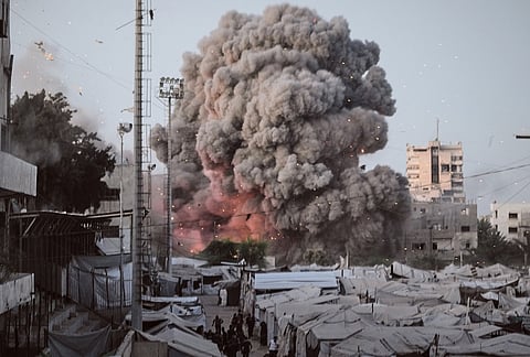 Smoke rises following an Israeli military strike in Gaza City.