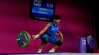(AP Photo/Manish Swarup) : Sanjana of India competes in the women's 77 kilogram weightlifting event during the Commonwealth Games in Glasgow, Scotland, Wednesday, July 29, 2026.