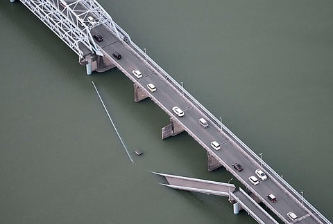 This aerial image shows a partially collapsed bridge after the earthquake in Yatsushiro, Kumamoto Prefecture, on Tuesday, July 28, 2026.
