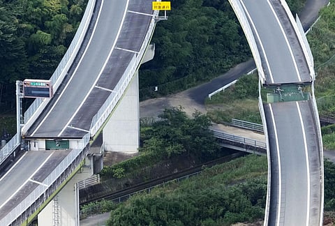 This aerial image shows a damaged highway after an earthquake in Yatsushiro, Kumamoto Prefecture, on Wednesday, July 29, 2026. 