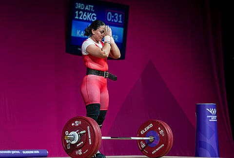 India's Harjinder Kaur gestures after completing her final attempt in the Women's 69kg weightlifting event at the Commonwealth Games 2026, in Glasgow, Scotland, Tuesday, July 28, 2026. Harjinder won the silver medal in the event. 