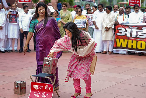 JMM MP Mahua Maji, TMC MP Mahua Moitra, Congress MPs Priyanka Gandhi Vadra, KC Venugopal, Sanjna Jatav and others stage a protest over the alleged embezzlement of donations at Ayodhya’s Shri Ram Janmbhoomi Temple during the ongoing Monsoon session of Parliament, in New Delhi.