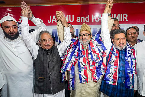 Apni Party President Altaf Bukhari greets senior political leaders and workers after they joined the party, in Srinagar, Jammu and Kashmir.