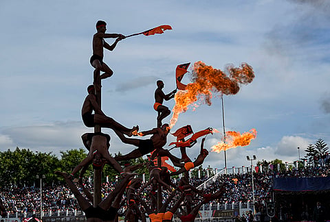 Performers showcase acrobatics and fire-breathing during the opening ceremony of the 135th IndianOil Durand Cup at Khuman Lampak Main Stadium, in Imphal, Tuesday, July 28, 2026. 