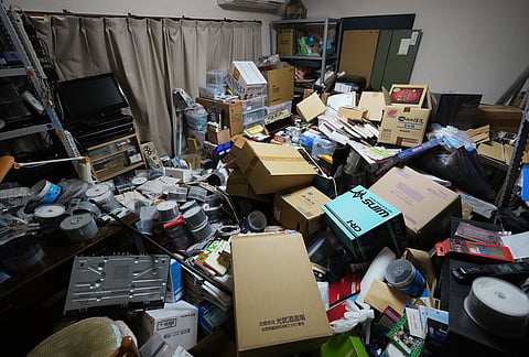 Kiyoshi Matsunaga, a local resident of Kumamoto, southwestern Japan, shows a damaged room of his home Wednesday, July 29, 2026, the day after an earthquake hit the area. 