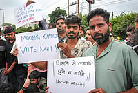 Outlook Explains | Why A Moong Protest Has Put Madhya Pradesh's BJP Government Under Pressure Photo: PTI : Farmers under the banner of Samyukt Kisan Morcha hold placards as they stage a protest to press for various demands, including 100 per cent moong procurement at MSP, in Bhopal, Madhya Pradesh, Wednesday, July 29, 2026.