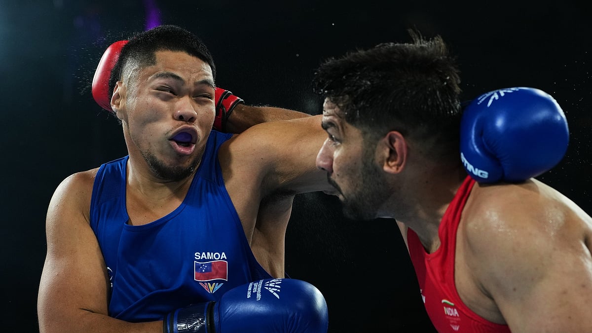 India's Narender Berwal, right, and Michael Seko of Samoa compete in the men's 90kg quarterfinal at the Commonwealth Games in Glasgow, Scotland, Wednesday, July 29, 2026 - (AP Photo/Eranga Jayawardena)
