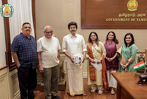 Tamil Nadu Chief Minister Joseph Vijay in a photograph with Mathrubhumi Printing and Publishing Company Limited Managing Director MV Shreyams Kumar, second right, Digital Commerce Director Selvi MS Mayura, Operations Director Selvi MS Devika, Public Relations General Manager KR Pramoth, and Division Manager Selvi Aishwarya Das during a meeting, at the Chief Secretariat in Chennai. 