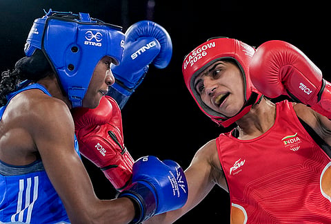 India's Preeti Pawar, in red, competes against Zambia's Catherine Mwape in the women's 54kg semifinal boxing match at the 23rd Commonwealth Games, in Glasgow, Scotland. Preeti sailed into the CWG final by out-punching Mwape in the last-four stage on Friday. 