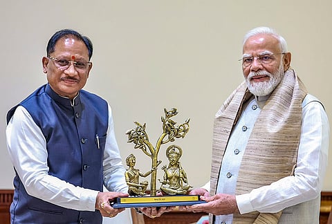 Prime Minister Narendra Modi being felicitated a memento by Chhattisgarh Chief Minister Vishnu Deo Sai during a meeting, at Parliament House in New Delhi. 