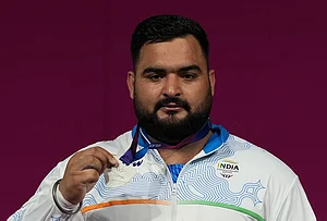 | Photo: AP/Eranga Jayawardena : India's Lovepreet Singh competes in the men's +110kg Weightlifting Final at the Commonwealth Games in Glasgow, Scotland, Thursday, July 30, 2026.