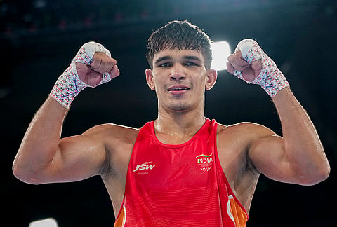 India's Ankush Panghal celebrates after winning a men's 80kg semifinal boxing match against Canada's Joshua Ofori at the 23rd Commonwealth Games, in Glasgow, Scotland.