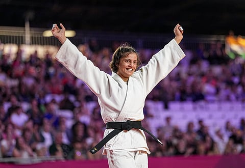 
India's Asmita Dey celebrates after defeating Canada's Heidi Quach to win the gold medal in the Women's 48kg judo event at the Commonwealth Games 2026, in Glasgow, Scotland, Friday, July 31, 2026.