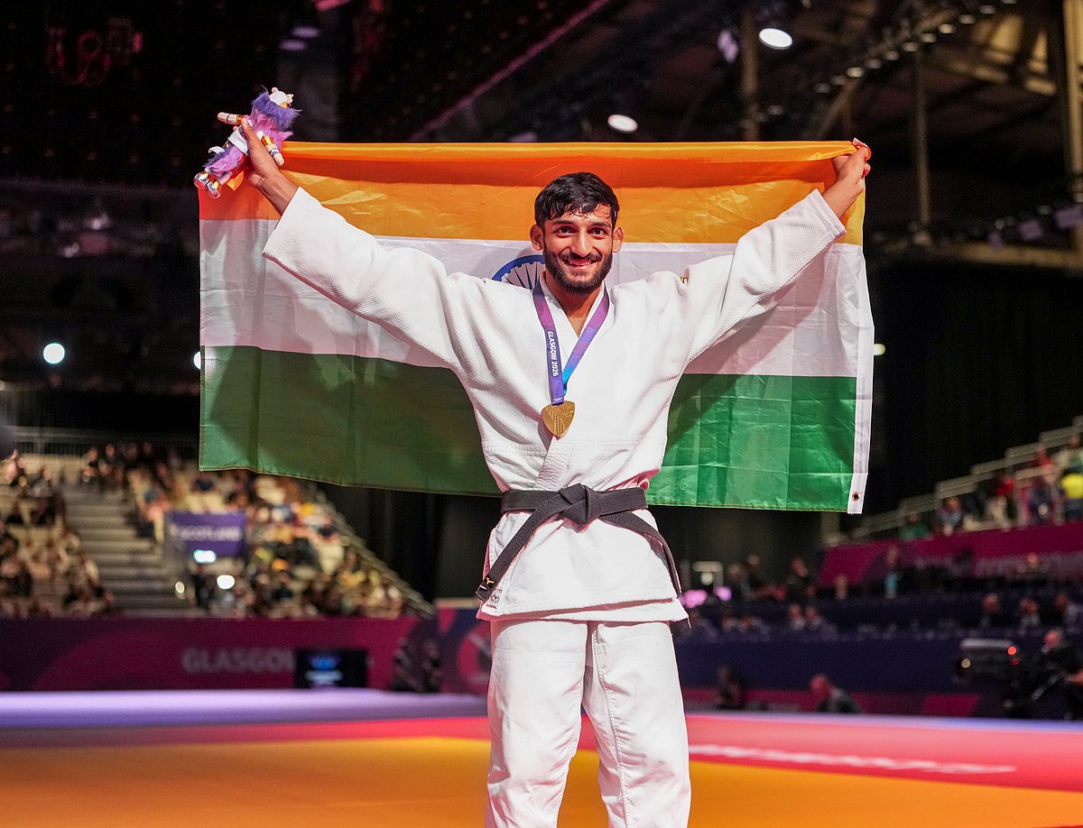 (PTI Photo/Ravi Choudhary) : lead. Indias Harsh Singh holds the national flag as he poses for photographs during the presentation ceremony for the mens 60kg judo event at the 23rd Commonwealth Games, in Glasgow, Scotland, Friday, July 31, 2026. Singh clinched a historic gold, becoming the first male judoka from the country to win the title, pulling off a victory over Australias vastly experienced Katz in the final on Friday.