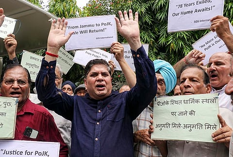 People of displaced community staged a protest condemning the ongoing atrocities by Pakistan in Pakistan-occupied Jammu & Kashmir (POJK), outside SOS International office in Jammu.
