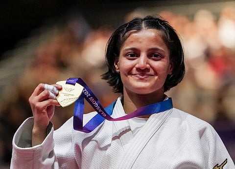 India's Asmita Dey poses with her gold medal during the victory ceremony for the Women's 48kg judo event at the Commonwealth Games 2026, in Glasgow, Scotland, Friday, July 31, 2026. 