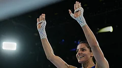 India's Sakshi celebrates after winning her bout with Northern Ireland's Caitlin Fryers in the women's 51kg quarterfinal at the Commonwealth Games in Glasgow, Scotland, Wednesday, July 29, 2026 - (AP Photo/Eranga Jayawardena)