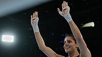 (AP Photo/Eranga Jayawardena) : India's Sakshi celebrates after winning her bout with Northern Ireland's Caitlin Fryers in the women's 51kg quarterfinal at the Commonwealth Games in Glasgow, Scotland, Wednesday, July 29, 2026