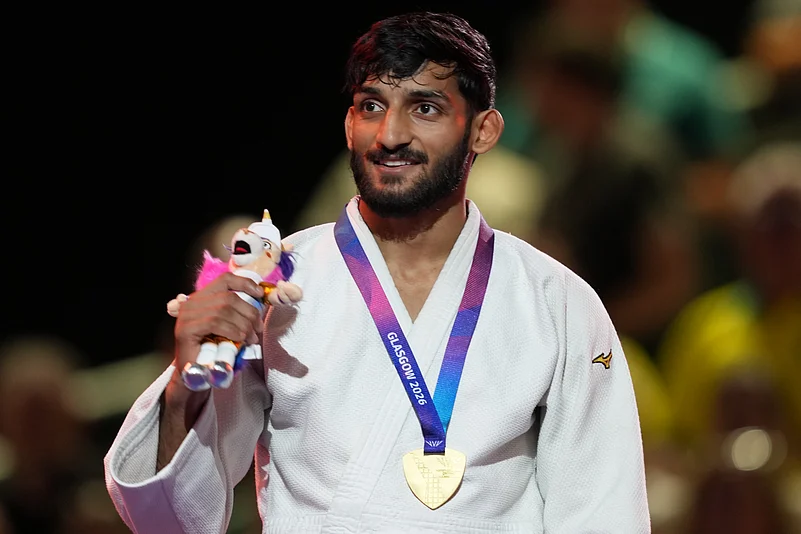 Harsh Singh Glasgow Commonwealth Games 2026 mens 60kg judo gold medal pose AP Photo
