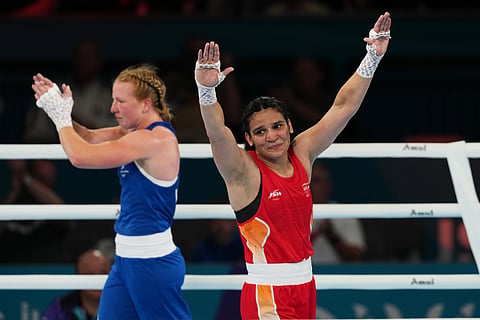India's Arundhati Choudhary, right, and Rosie Eccles acknowledge the crowd after the Women's 70kg Boxing semi-final at the Commonwealth Games in Glasgow, Scotland, Friday, July 31, 2026.