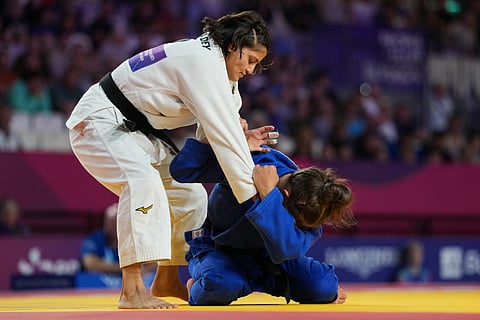 India's Asmita Dey, left, and Eva Ewing of Scotland compete in the Women's 48kg quarter-final Elimination Judo at the Commonwealth Games in Glasgow, Scotland, Friday, July 31, 2026.