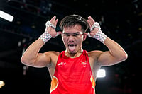PTI Photo : India's Jadumani Singh Mandengbam celebrates after defeating Namibia's Philip Pumulo Mutakela Haoseb in the Men's 55kg boxing semifinal at the Commonwealth Games 2026, in Glasgow, Scotland, Friday, July 31, 2026. Jadumani won the bout 5-0 to advance to the final.