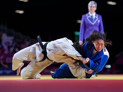 India's Asmita Dey, white, competes against Canada's Heidi Quach during the Women's 48kg judo final at the Commonwealth Games 2026, in Glasgow, Scotland, Friday, July 31, 2026.