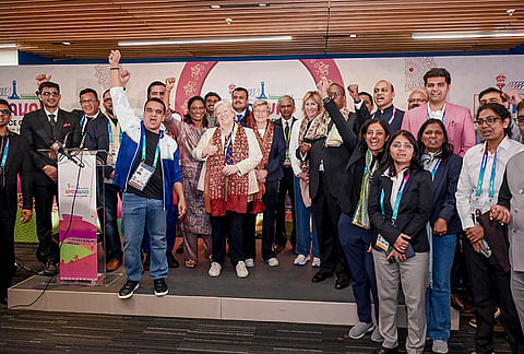 Gujarat Deputy Chief Minister Harsh Sanghvi poses for photographs with India’s Commonwealth Games contingent, in Scotland. 