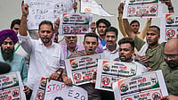 Photo: PTI/Karma Bhutia : Tehseen Poonawalla and others hold posters during a protest over the mandatory implementation of the 20% ethanol blending (E20) policy in petrol, at Jantar Mantar in New Delhi.