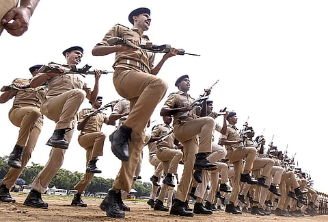 Security personnel participate in the parade rehearsal ahead of Independence Day celebrations, in Patna, Bihar.