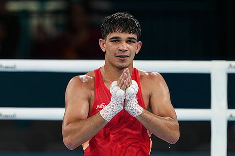 India's Ankush Panghal acknowledges the crowd after defeating Joshua Ofori of Canada in the men's 80kg light-heavyweight quarterfinal boxing bout at the Commonwealth Games in Glasgow, Scotland, Friday, July 31, 2026.